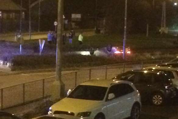The car on its roof by Lion Roundabout. Picture: Kent_999s/Mehmet Bagirtkan