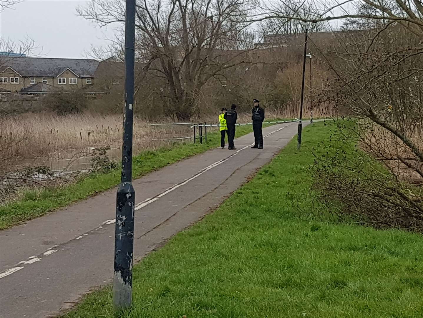 Police have been seen looking in the river. Picture: Charlie Harman