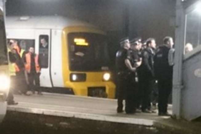 Armed police at Gillingham train station