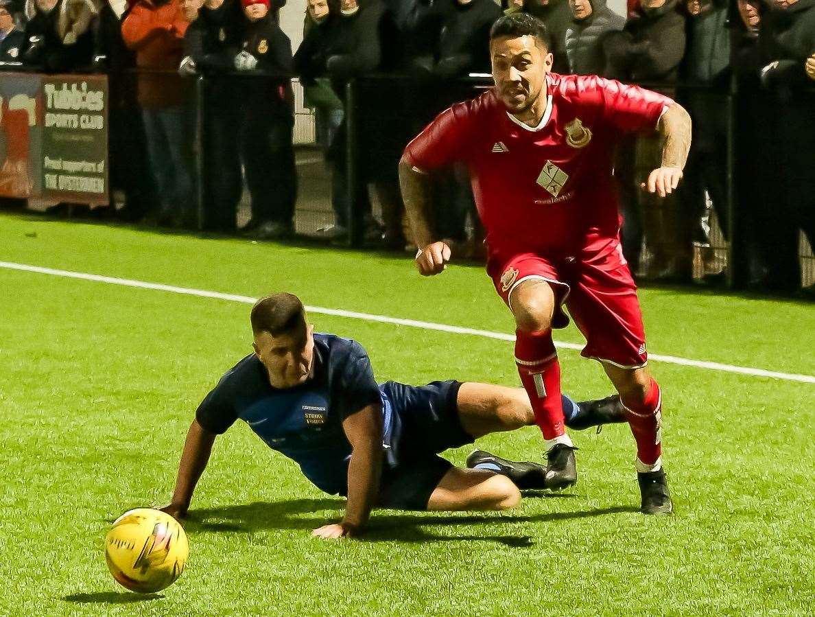 Whitstable's Harrison Carnegie rides a tackle against Faversham Strike Force in Saturday's Kent Senior Trophy extra-time Quarter-Final win. Picture: Les Biggs