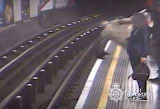 The shocking moment former Eurotunnel chairman Sir Robert Malpas was pushed onto the tracks at Marble Arch. Picture: British Transport Police