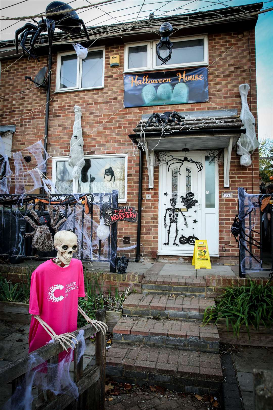 Andrew Damms and Helen Clark who have created a Halloween display in their garden to raise money for Cancer Research UK. Picture: Matthew Walker FM4976556 (4833772)