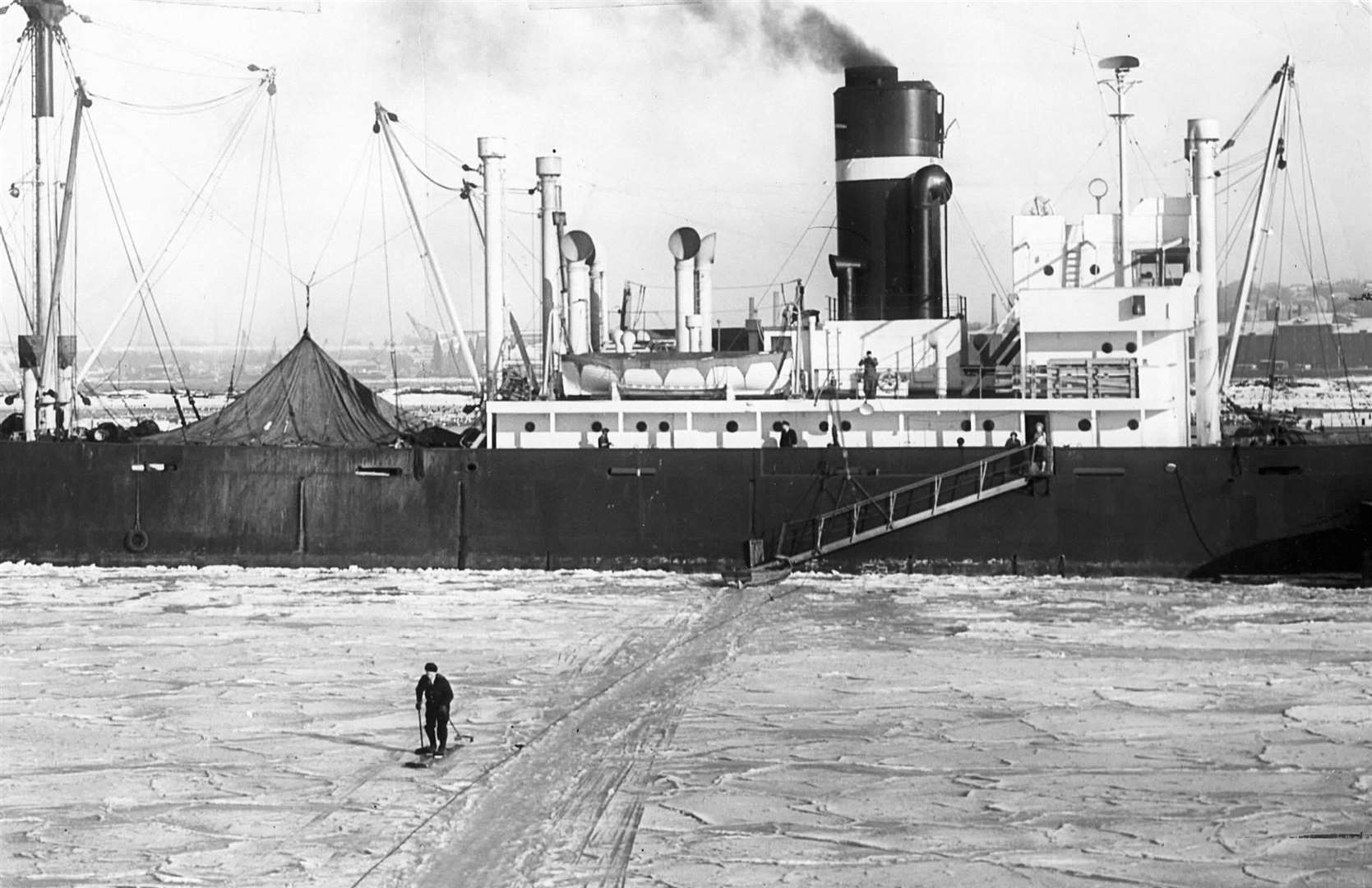 A seaman skies across the frozen River Medway at Rochester from his ship to visit the shops on January 25, 1963, after his boat was trapped in ice
