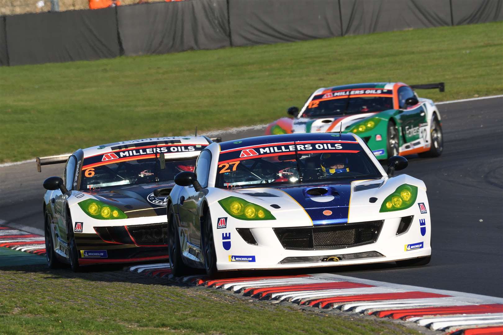 Emson withstood pressure from champion James Kellett in the Ginetta GT4 Supercup
