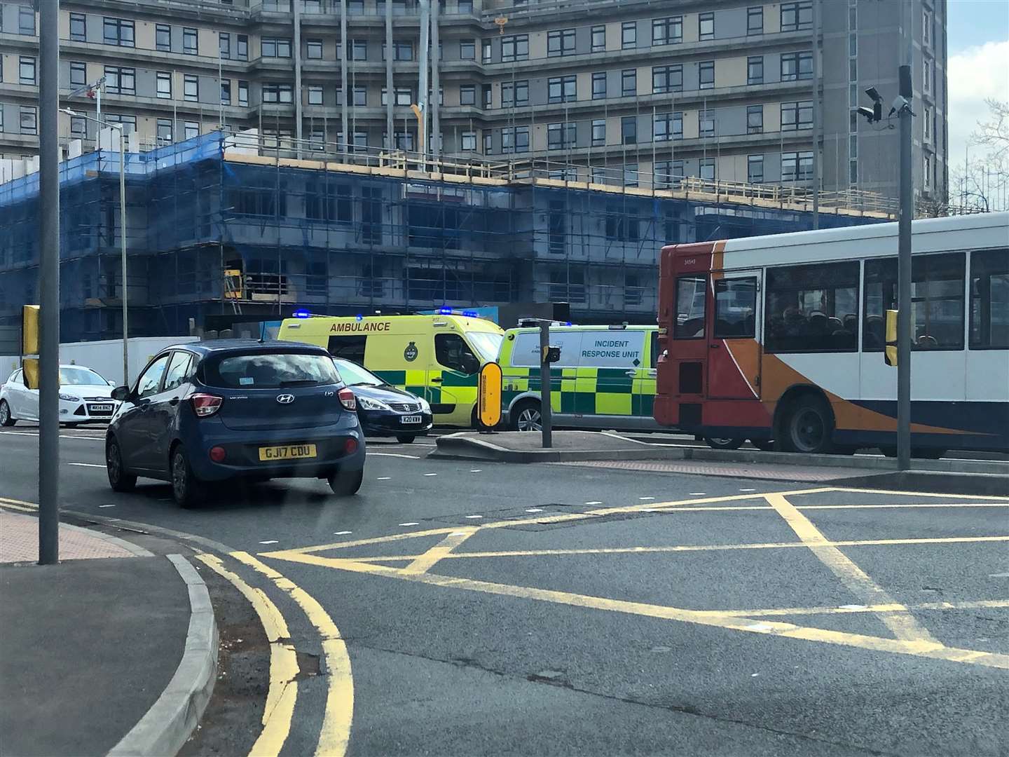 Ambulance crews and police at the scene. Picture: Steve Salter