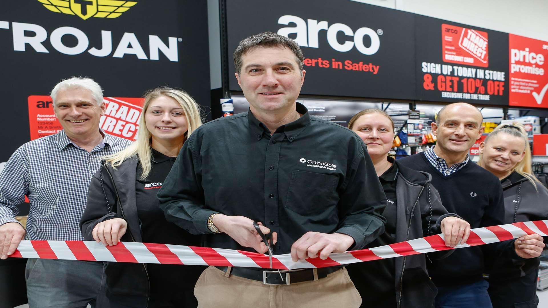 Arco safety shop opens at Acorn Industrial Park, Crayford. L-R Nick Clark - manager, Chloe Georgiou, Ronnie Irani - former Essex and England Cricketer, Charmaine Brignull, Paul Frewin - retail director, and Debbie Capon