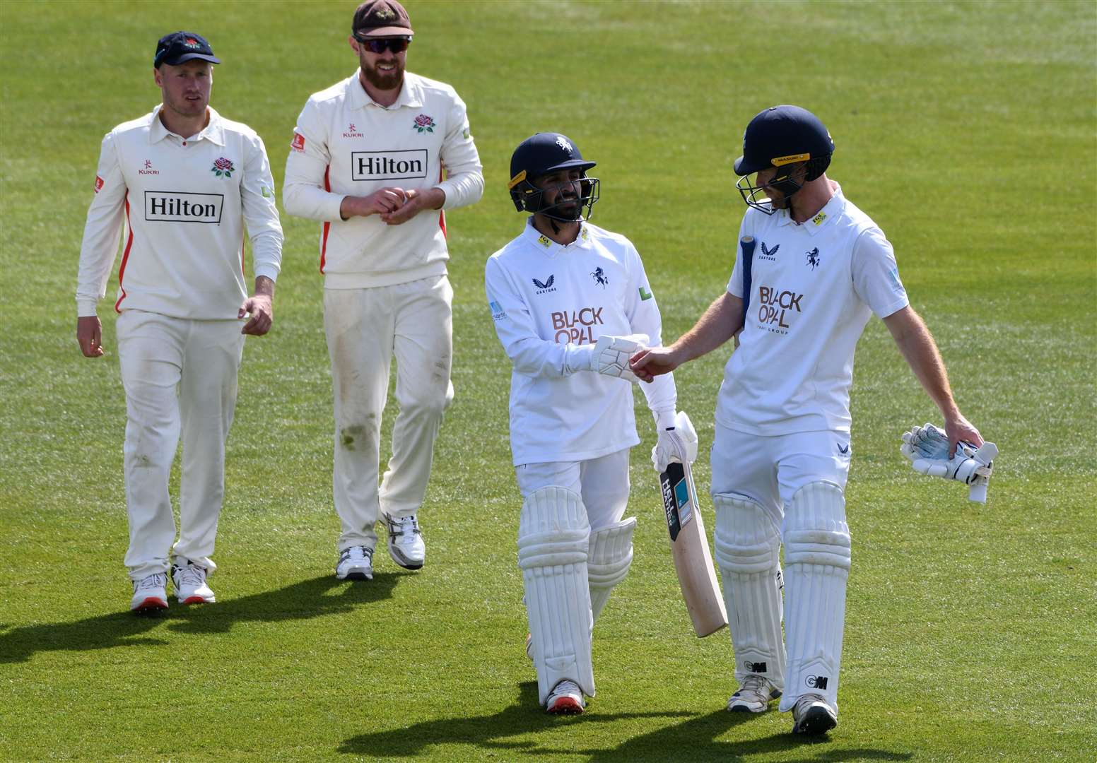 Kent duo Hamidullah Qadri and Ben Compton head in for lunch on day four. Picture: Barry Goodwin
