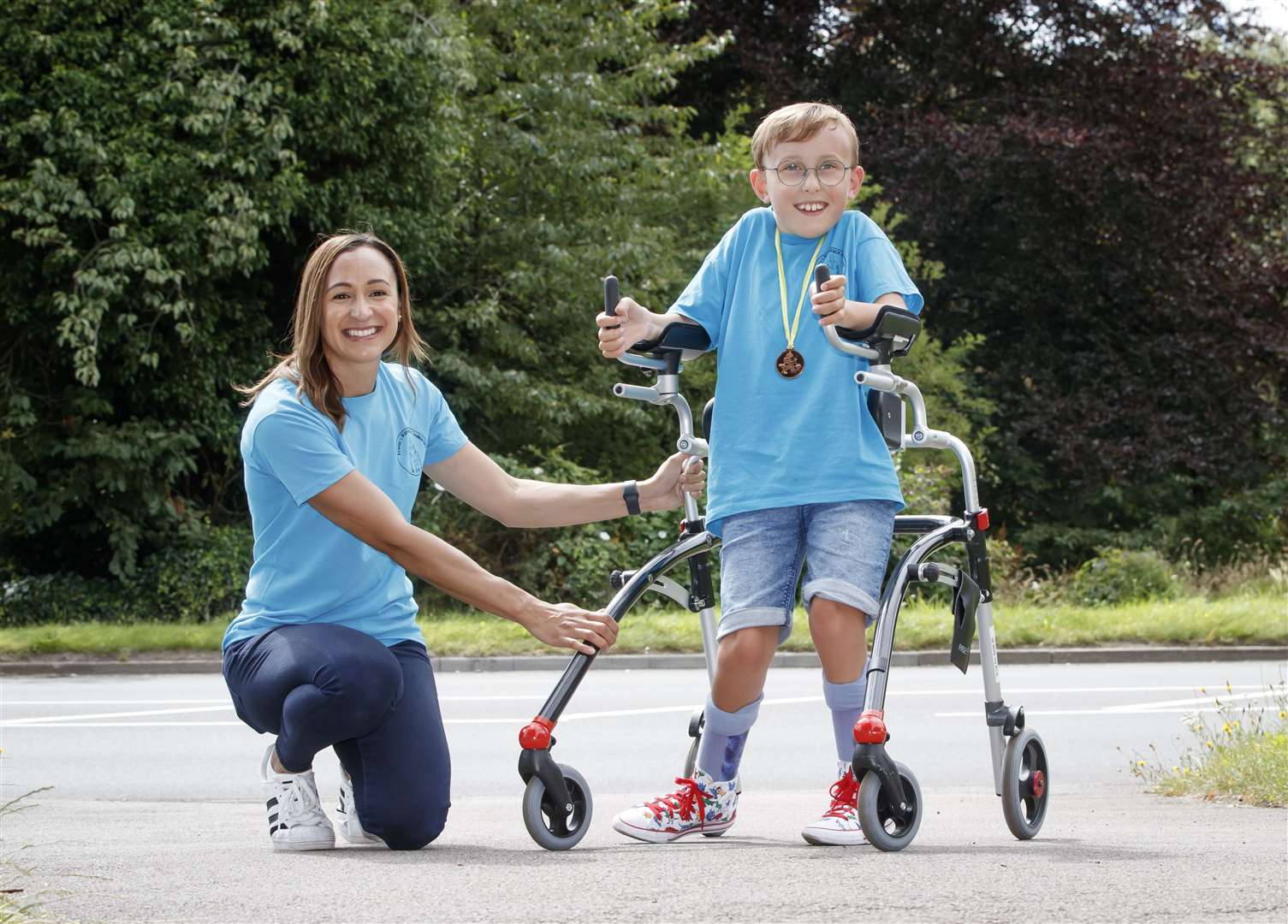 Tobias Weller, who has cerebral palsy and autism, was cheered on in August by Olympic athlete Jessica Ennis-Hill, after he completed his latest challenge to run a marathon in a street near his home in Sheffield, using a race runner. Tobias, who cannot stand or walk unaided, was inspired by Captain Sir Tom Moore to complete his first marathon on his daily walks back in April (Danny Lawson/PA)