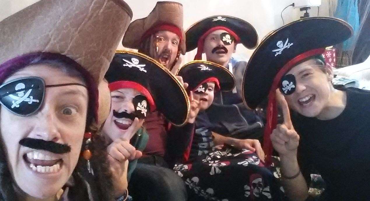 The Dickenson's will be cheering everyone on in their pirate costumes