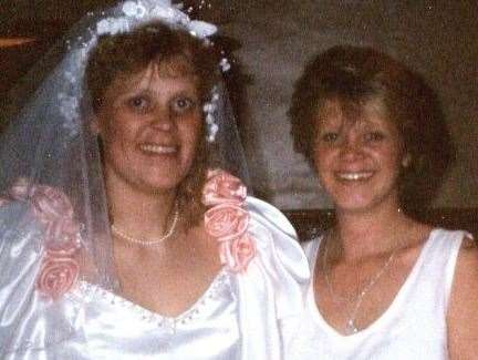 Debbie Griggs on her wedding day pictured with her sister Wendie Rowlinson