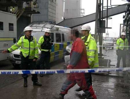 Police arrest Greenpeace protestors at Kingsnorth Power Station.