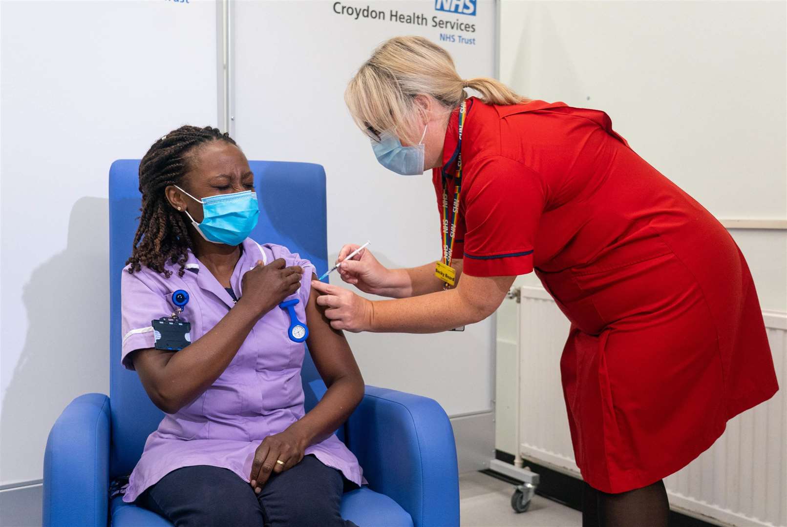 Catherine Cargill receiving one of the first Covid-19 booster jabs, administered at Croydon University Hospital, south London (Dominic Lipinski/PA)