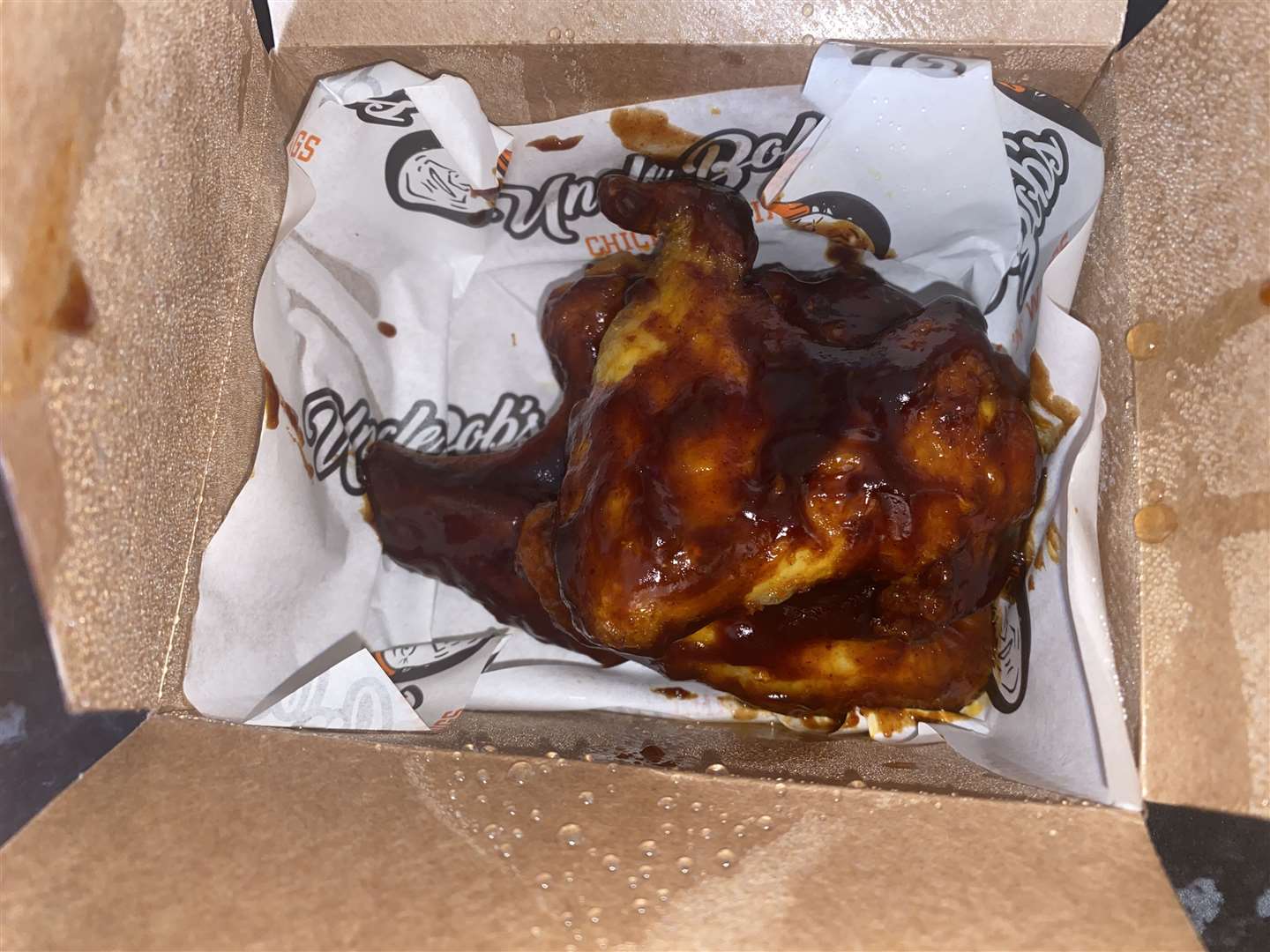 A box of three two-joint barbecue wings