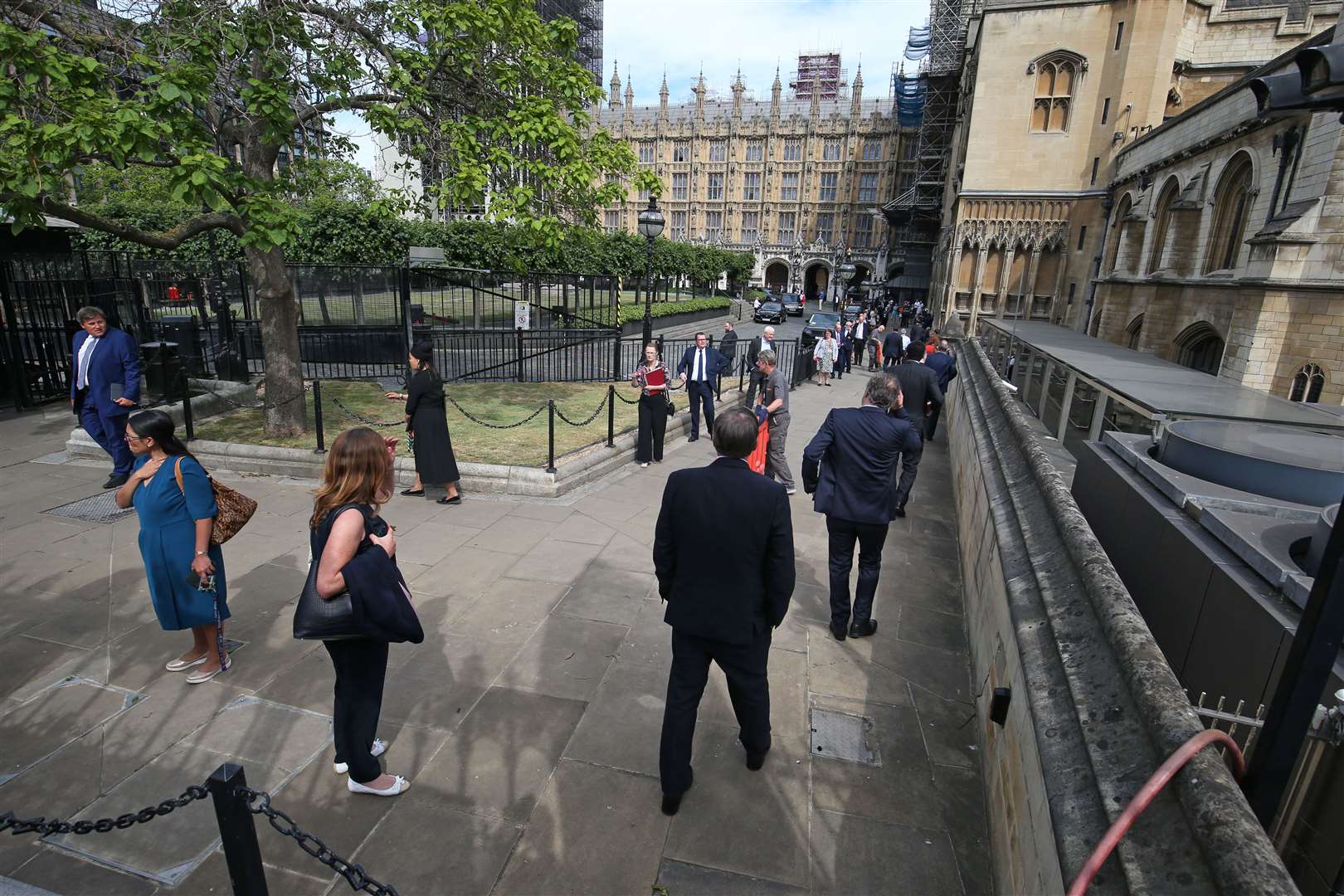 MPs lining up to vote in the Commons (Jonathan Brady/PA)