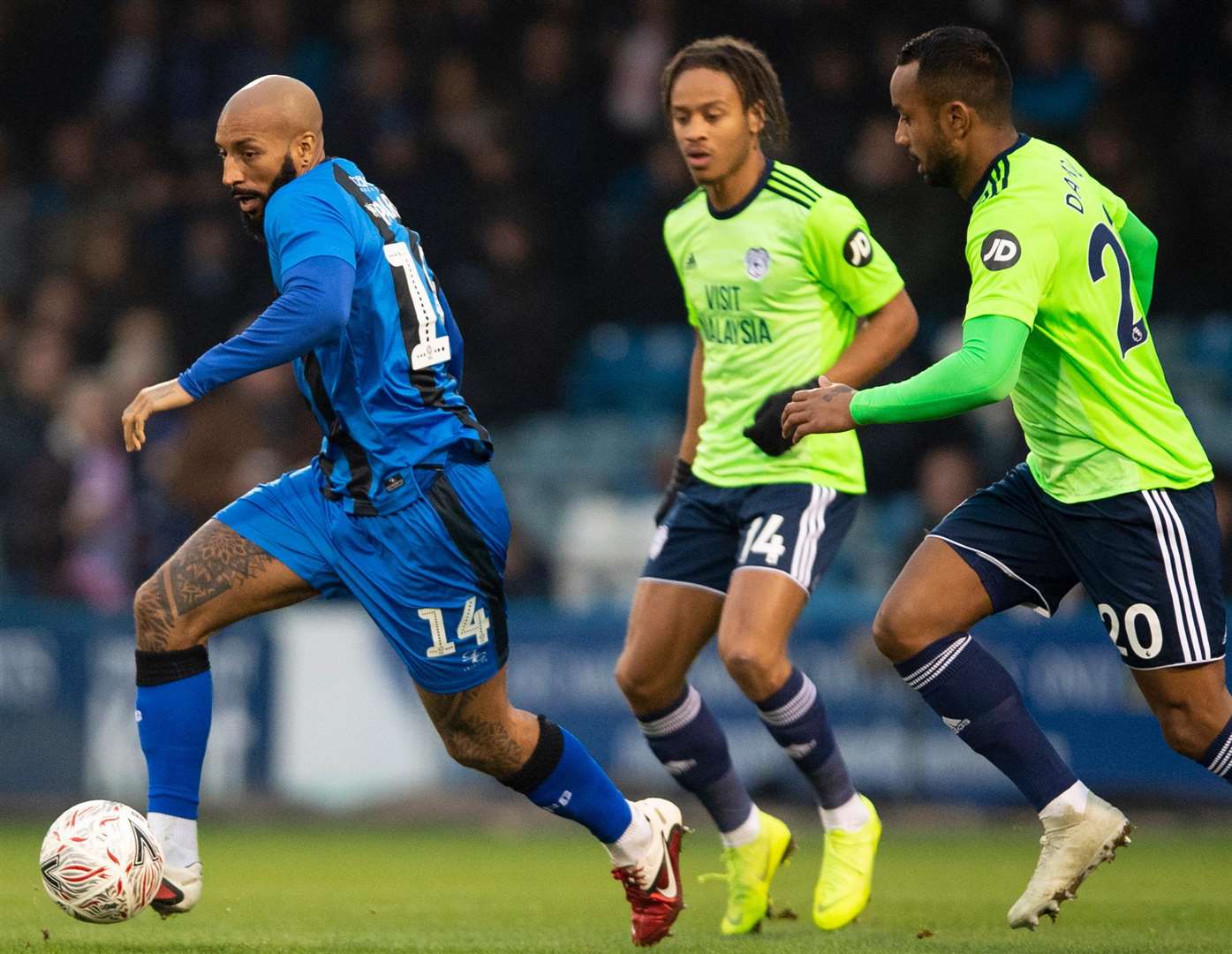 Josh Parker looks to set an early attack up, getting away from Loie Damour and Nathaniel Mendez-Laing Picture: Ady Kerry