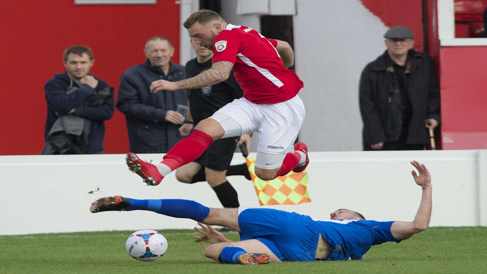 Billy Bricknell hurdles a tackle against Hayes & Yeading Picture: Andy Payton