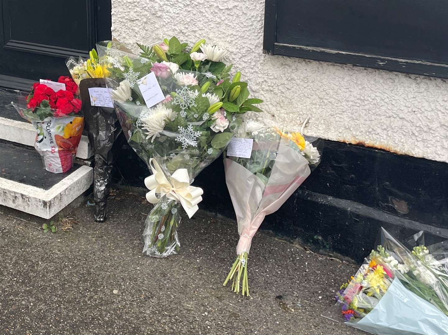 Floral tributes left at the pub after landlord Matthew Bryant died