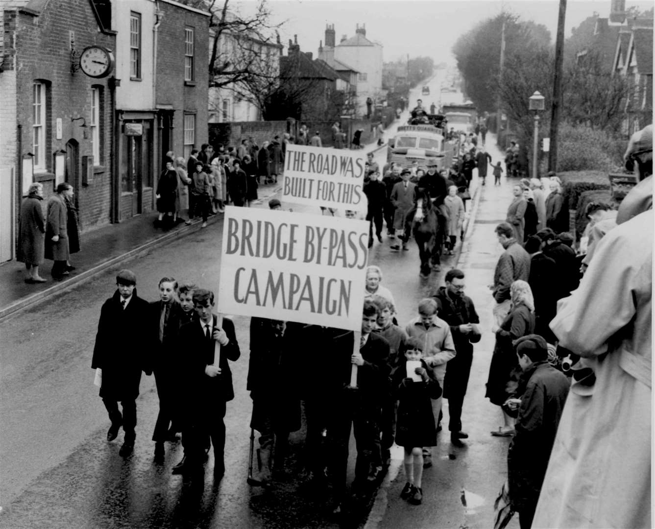 A coffin and a wrecked car were included in a protest procession through the streets of Bridge, near Canterbury, on Easter Sunday 1964 as part of the villagers' bypass campaign. Eight people had died and 50 had been injured in the village in the previous five years. Bridge Bypass opened in June 1976