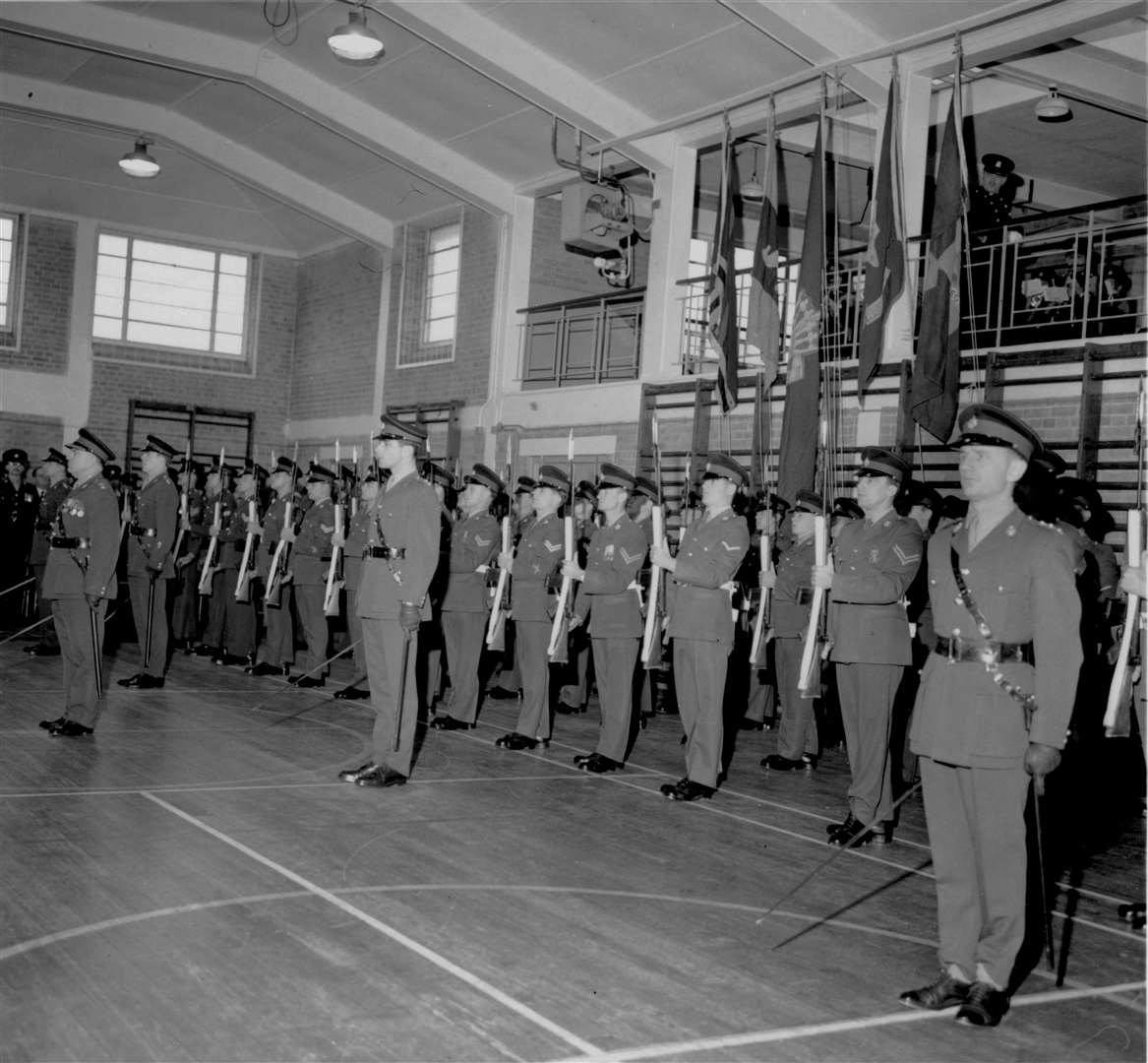 The flags of four famous regiments were lowered for the last time at Howe Barracks in Canterbury in December 1966. With them came down the flag of the Home Counties Brigade Depot. The ceremony marked the passing of four Home Counties regiments: The Queens Royal Surrey, Queen's Own Buffs (The Royal Kent Regiment), Royal Sussex and Middlesex. Seconds later a fanfare sounded and a new flag was raised, marking the birth of the Queen's Regiment