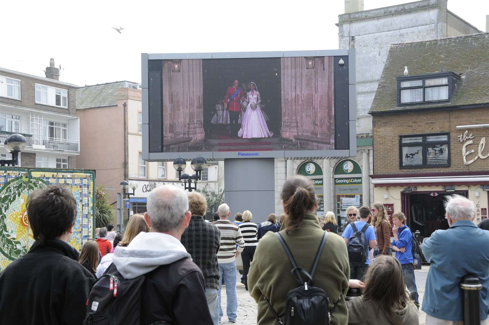 Crowds turned out to Dover's Market Square to watch the wedding on big screen. Picture: Paul Amos