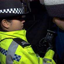 A police officer conducts a breath test. Submitted by Kent Police.