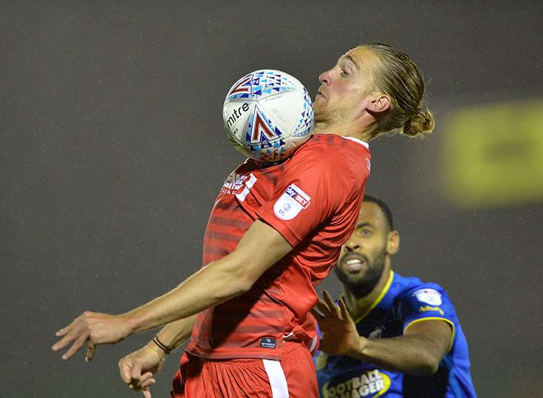 Tom Eaves with the ball for Gillingham Picture: Ady Kerry