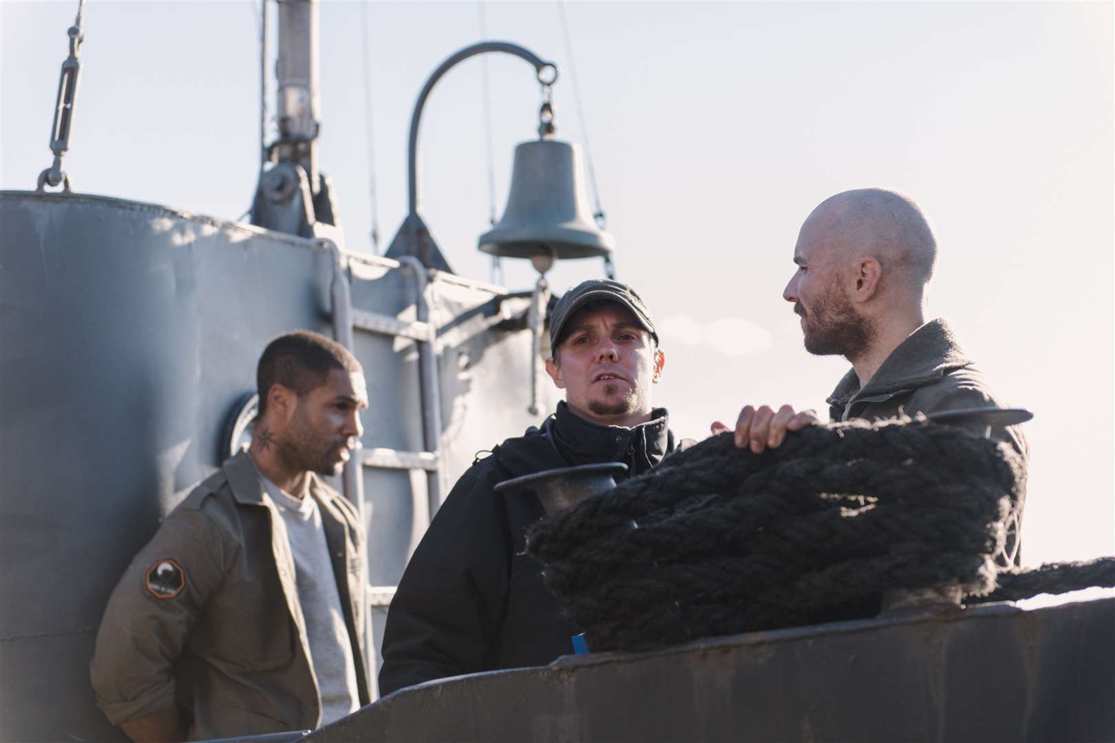 Actor Lucien Laviscount, director Tanel Toom and actor Martin McCann on set of The Last Sentinel. Picture: Kristi Tuvi