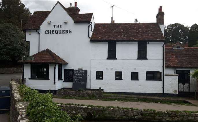 The Chequers pub along the road in Loose