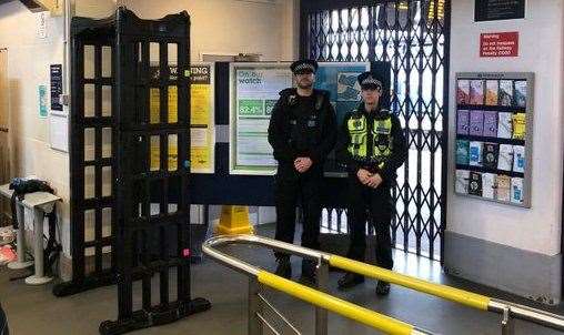 Officers at the metal detecting arch at the station. Picture: Kent Police.