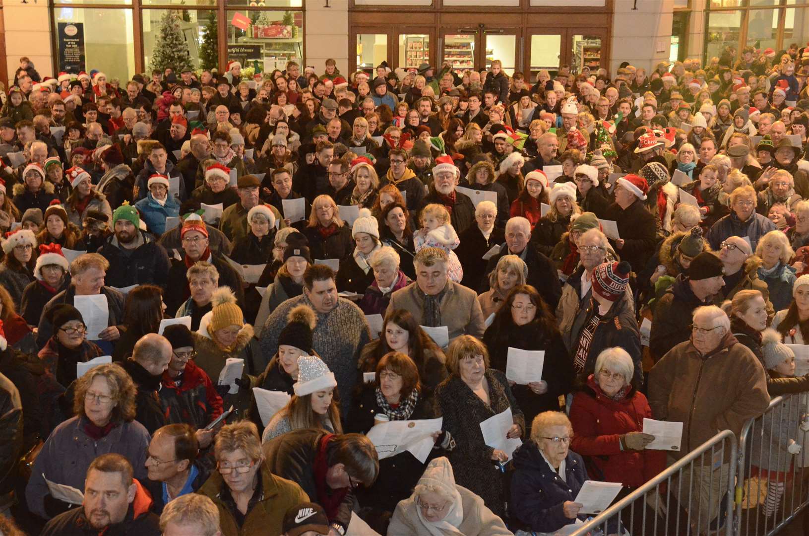 The Christmas Eve community carol singing usually attracts a big crowd