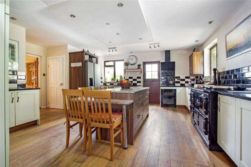 The cottage has two floors and three bathrooms. Picture: Rightmove/Hamptons