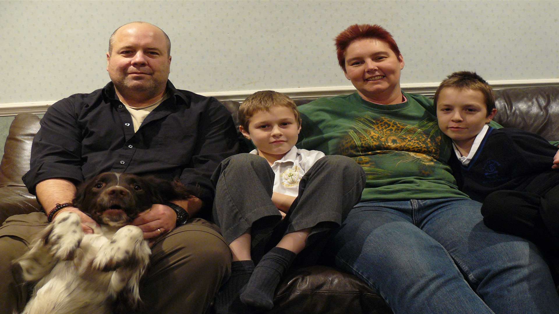 Kipper the cat's owners left to right: Jeff, Mutt the dog, Ben, 12, Amanda Lewis and Sam, 14