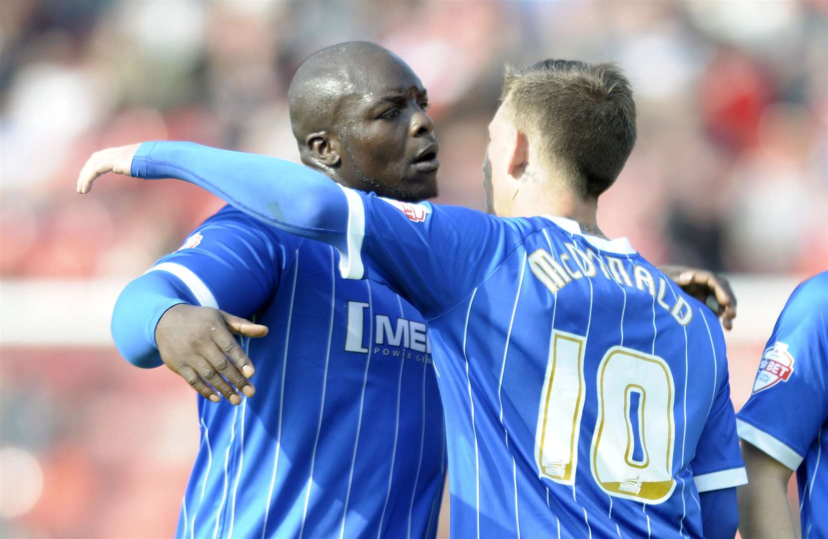 Bayo Akinfenwa and Cody McDonald celebrate a goal for Gillingham Picture: Barry Goodwin