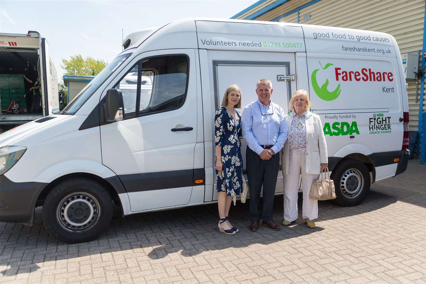 Kent FareShare Operations Manager Paul Underdown poses for a picture with Kent High Sheriff Jane Ashton, left, and Mayor of Ashford Cllr Jessamy Blanford, right, at the opening of FareShare's relocated warehouse in Ashford (11063076)