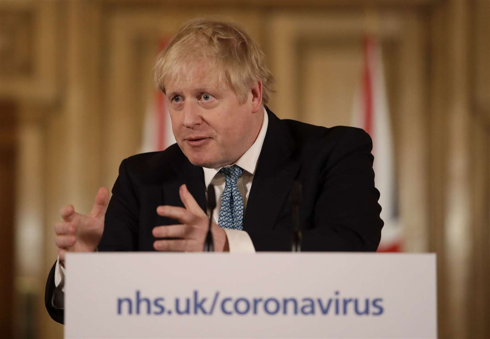 Prime Minister Boris Johnson speaking at a media briefing in Downing Street