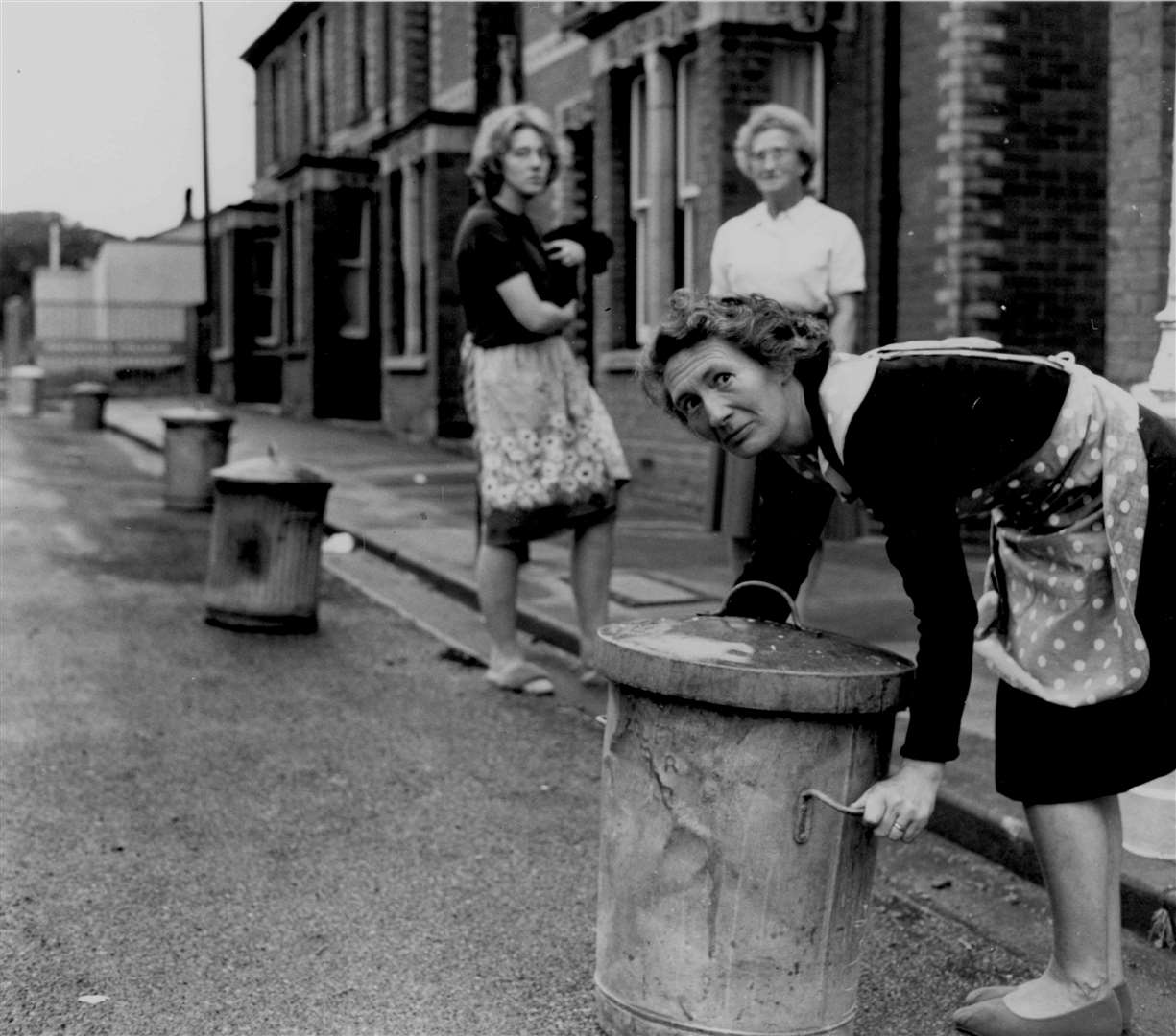 Women living in Edward Road, Canterbury, used dustbins to stop students from the Technical College parking outside their homes in October 1964. Since the college had opened the previous month, the residents of Edward Road and Albert Road had signed a petition asking for parking restrictions to be imposed