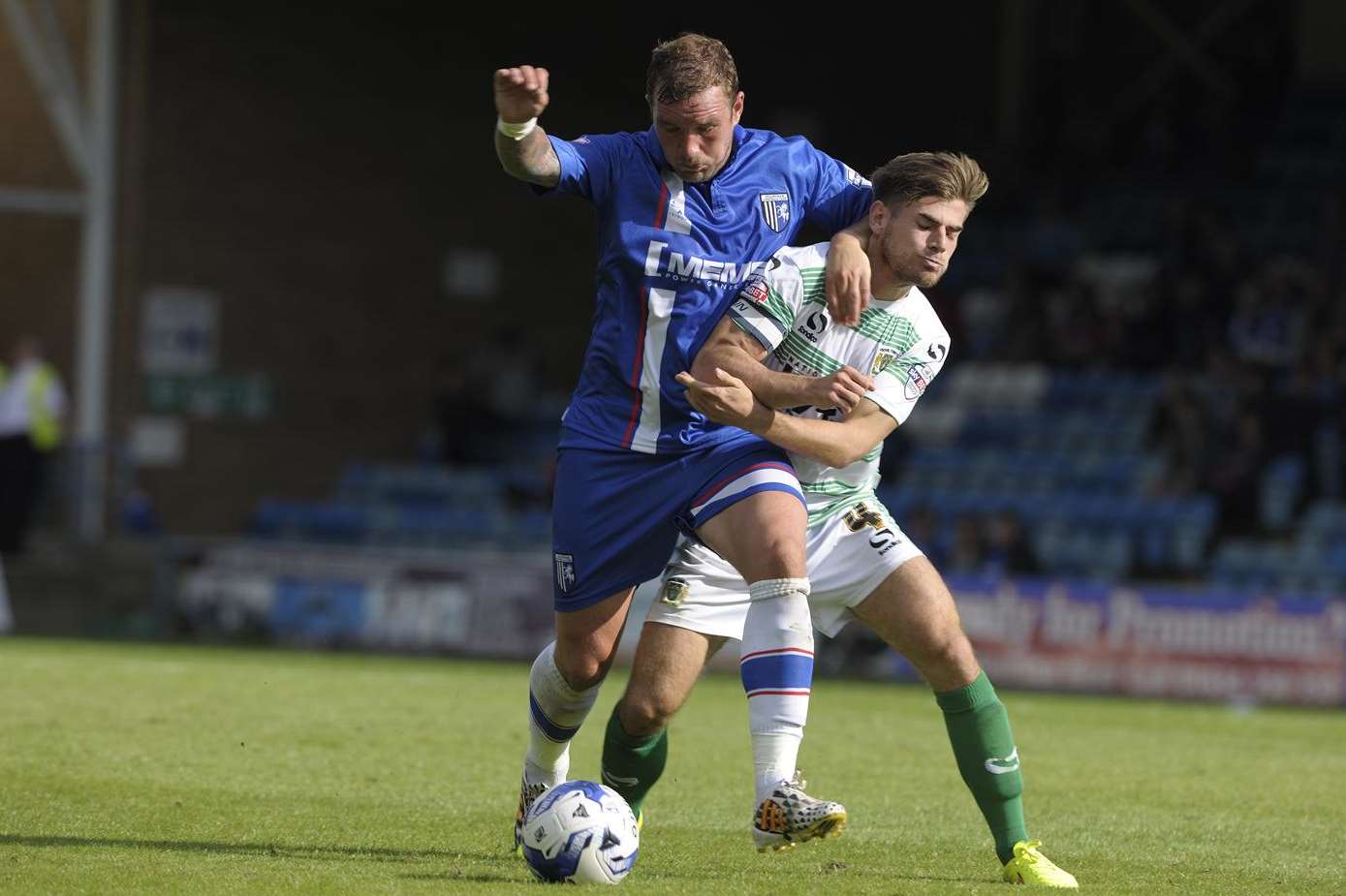 Danny Kedwell closes down Yeovil captain Joe Edwards on Saturday. Picture: Barry Goodwin