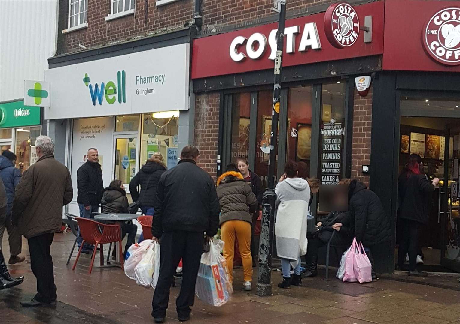 The crowd of people outside Costa Coffee in Gillingham High Street. Picture: Bobby Lockwood