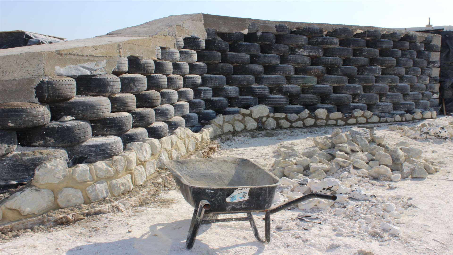 The spectacular tyre wall being hidden behind Kentish ragstone cladding