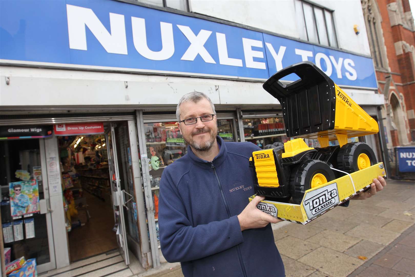 Richard Ray, Manager of Nuxley Toys with a classic Tonka Truck. Picture: John Westhrop.