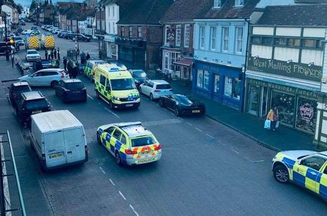Police at the scene in West Malling after three women were injured in High Street