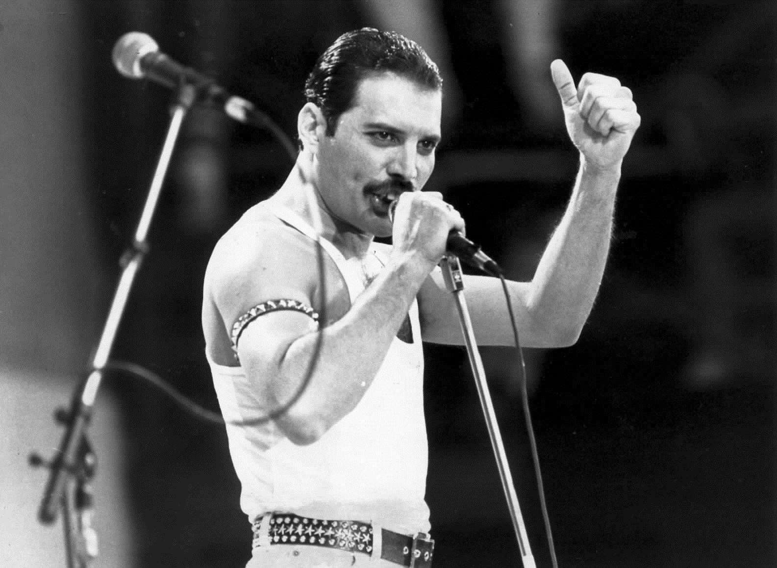 Rock Singer Freddie Mercury, lead singer with the group 'Queen', performing on stage during the Live Aid concert of 1985. Photo: PA