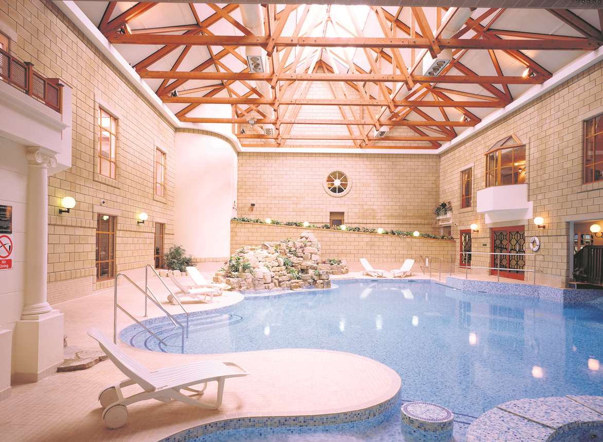 The swimming pool at Tudor Park Marriott Hotel and Country Club in Bearsted, Maidstone
