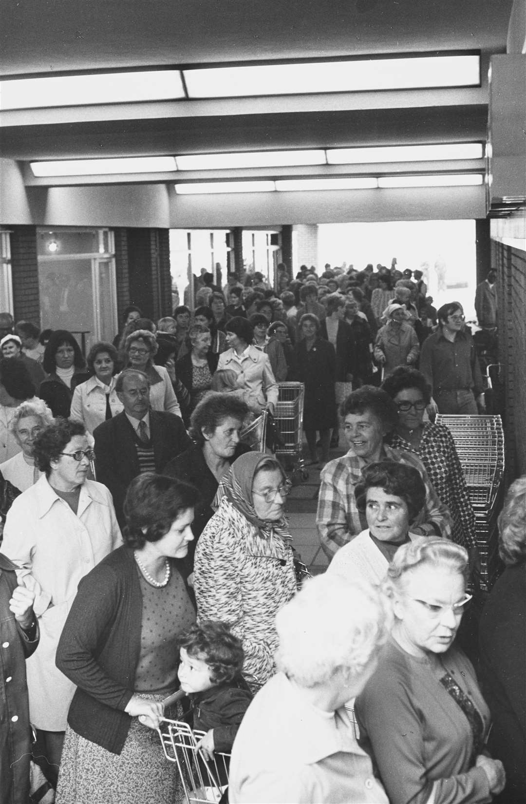 A sign of the times? See how many men you can spot in this picture of opening day at the Sainsbury's store in Sittingbourne's Bell Shopping Centre, 1976. Picture: The Sainsbury Archive, Museum of London Docklands