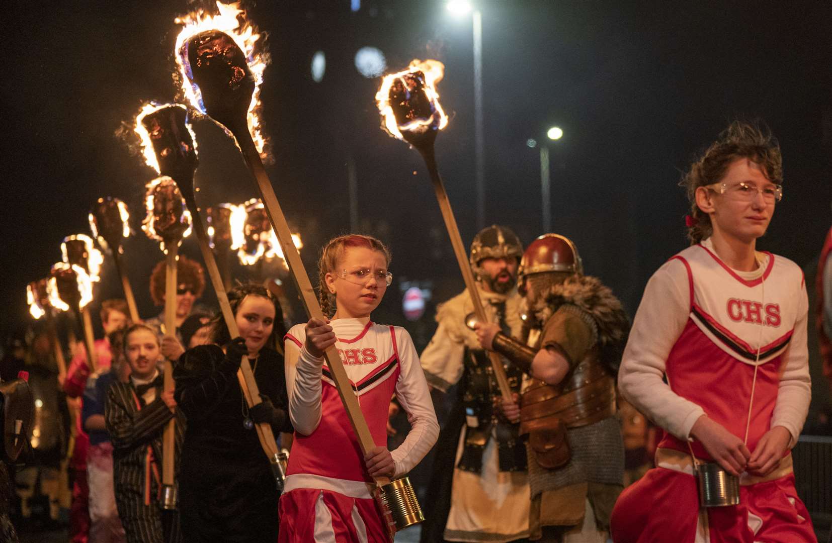 Women took part in the festival, which dates back to the 1880s and celebrates Shetland’s Norse heritage, for the first time in 2023. Here, youngsters take part in the Junior Up Helly Aa (PA)