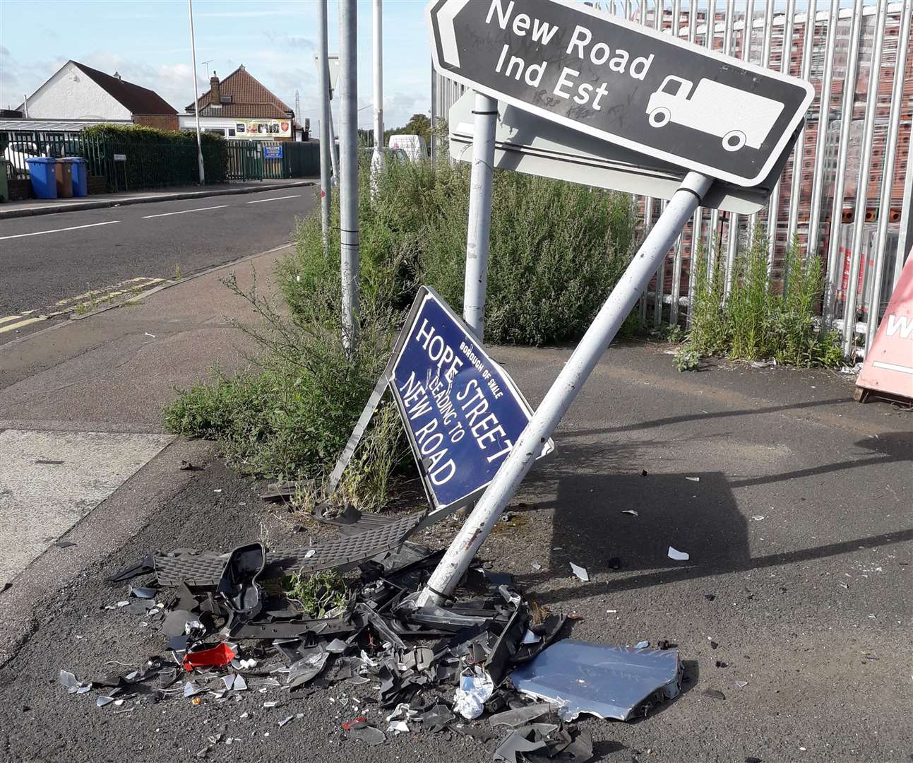 Signs damaged in New Road, Sheerness, after a two-car crash on Friday. Picture: Phil Crowder