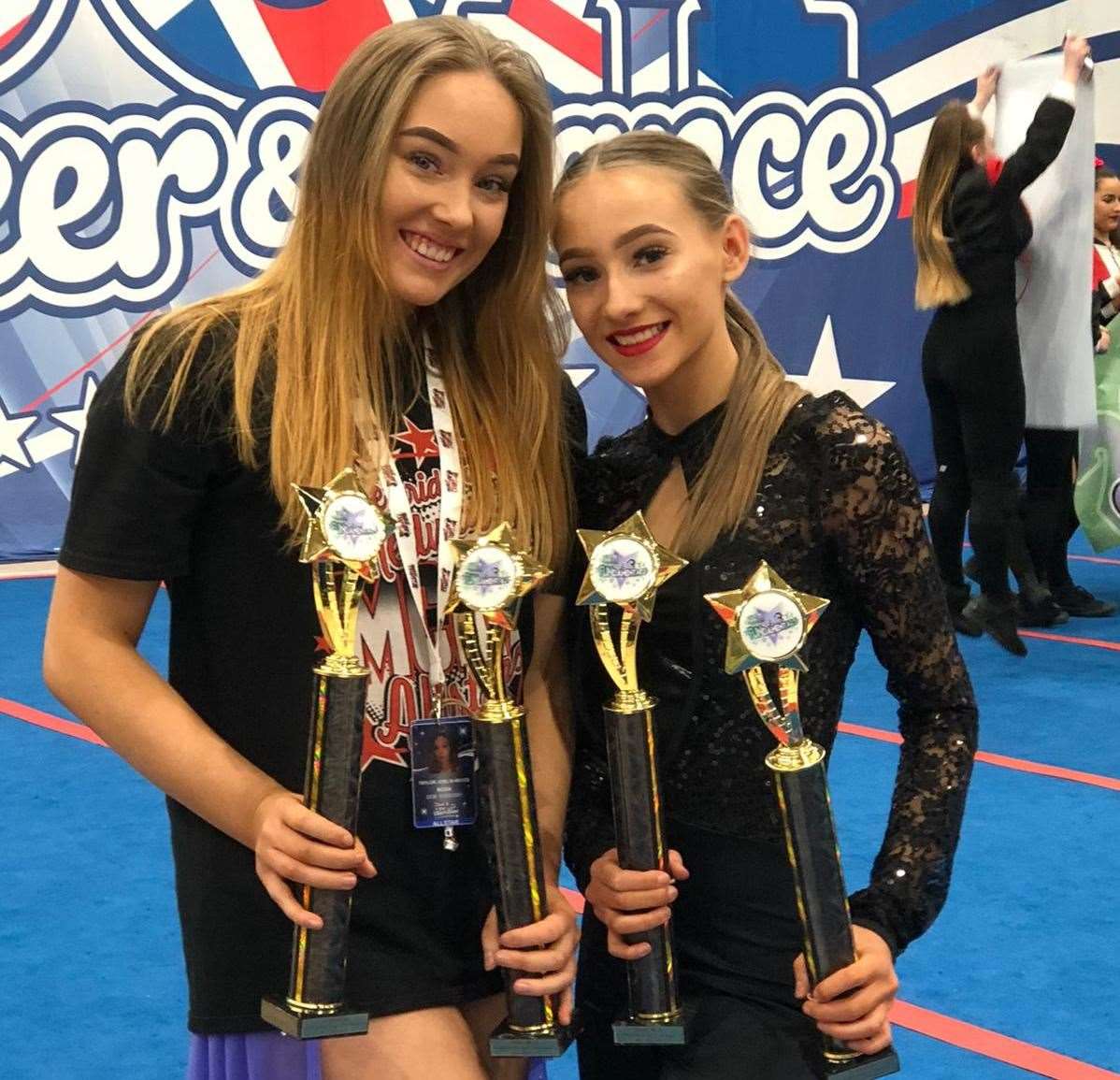 Taylor and Madison Joslin-Wood with their trophies after a cheerleading competition. Picture: Jennifer Joslin-Wood