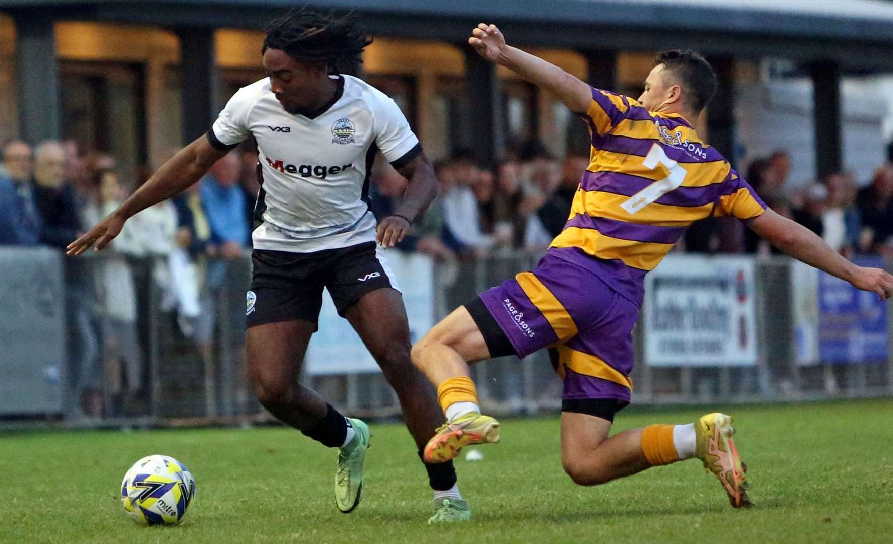 Fuad Sesay, of Dover, up against Deal Town's Rory Smith in last Tuesday’s 5-3 friendly victory. Picture: Paul Willmott