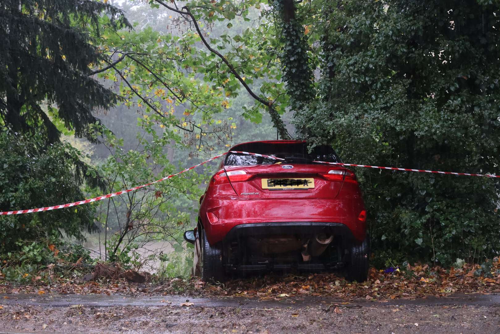 A car has crashed off a grass verge in Ashford Road, Bearsted. Picture: UKNIP
