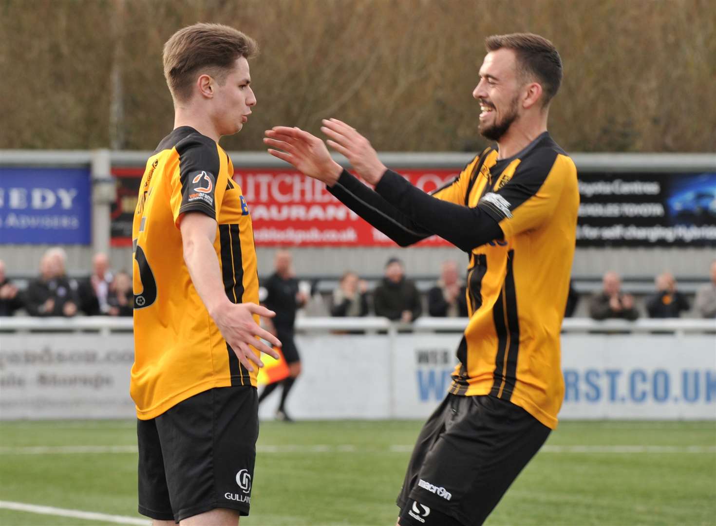Jake Embery is congratulated by Jack Powell, the scorer of United's second Picture: Steve Terrell